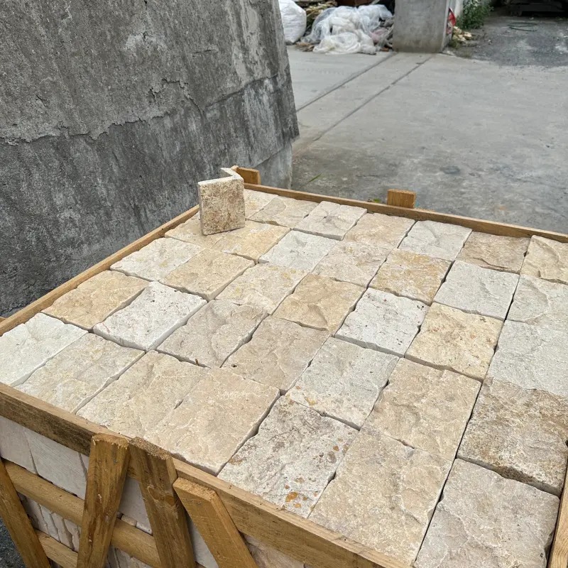 Tan Limestone Stacked Stone, tan ledger stone panels laid out before installation