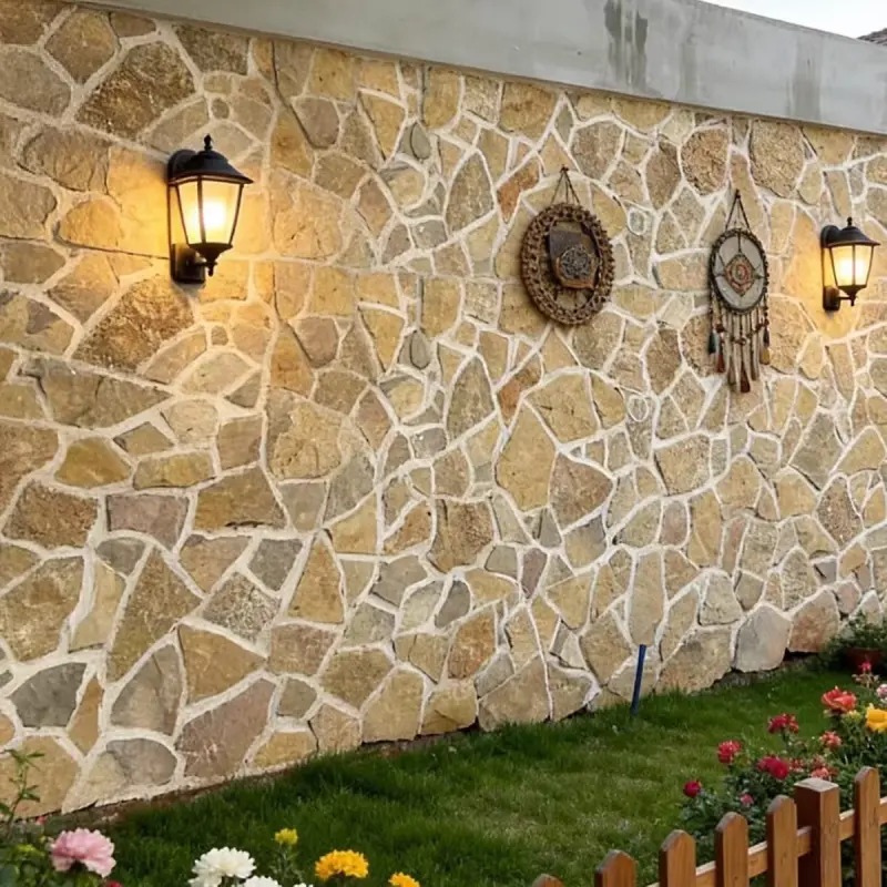 Light Golden Random Fieldstone outdoor garden wall with vintage wall lamp